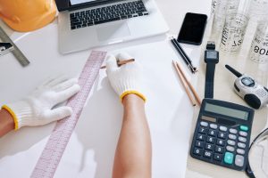 Architect drawing project of building